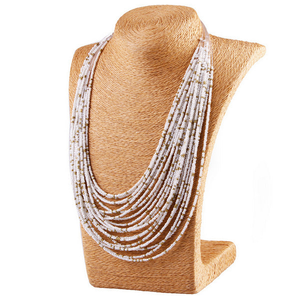 Retro Personality water drop multi-layer rice bead necklace.